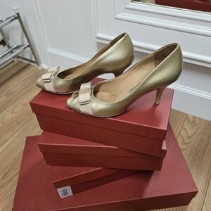 Ferragamo Gold Peep-Toe Heels with Bow Accent